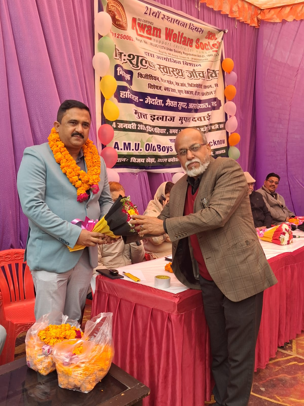 Awam Welfare Society bouquet presentation